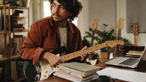 A musician organizing finished mixes and release notes across multiple songs, representing catalog strategy